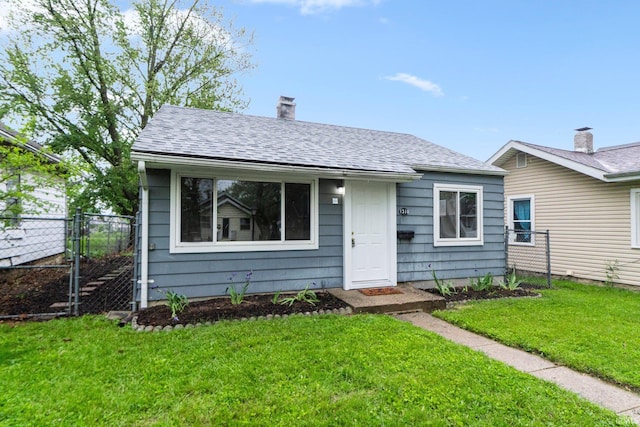 1510 W 4th St, Fort Wayne, IN 46808 - bungalow with a chimney and roof with shingles