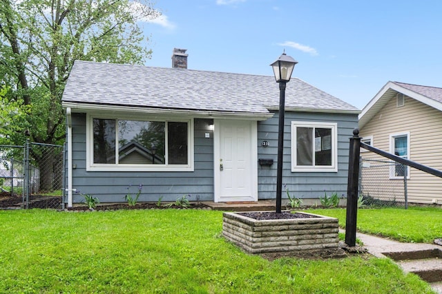 1510 W 4th St, Fort Wayne, IN 46808 - bungalow-style house with a chimney and roof with shingles