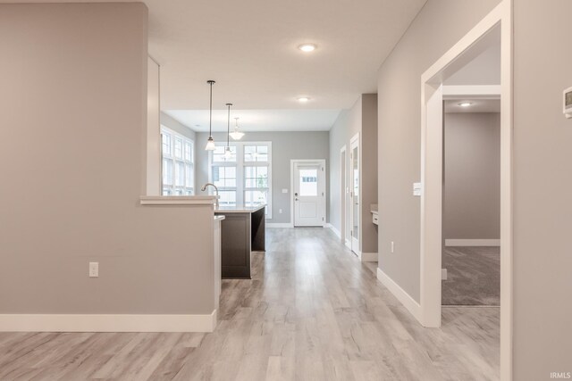 1590 S Renwick Blvd, Bloomington, IN 47401 - entryway featuring baseboards, light wood-style flooring, and recessed lighting