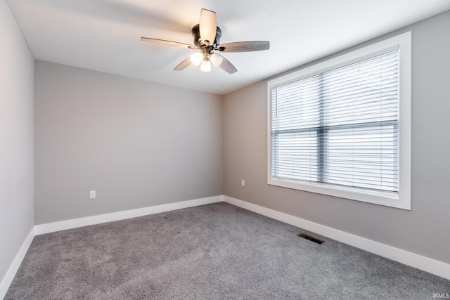 1590 S Renwick Blvd, Bloomington, IN 47401 - carpeted empty room featuring ceiling fan and baseboards