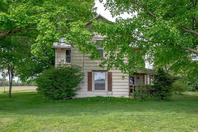 5668 E 500 S, Lynn, IN 47355 - view of side of home with a lawn