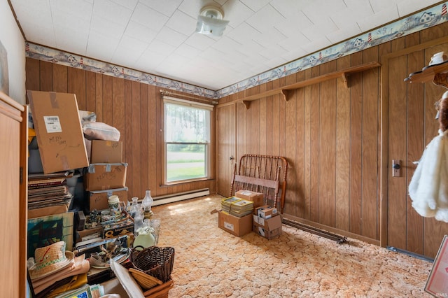 5668 E 500 S, Lynn, IN 47355 - living area featuring baseboard heating and wood walls