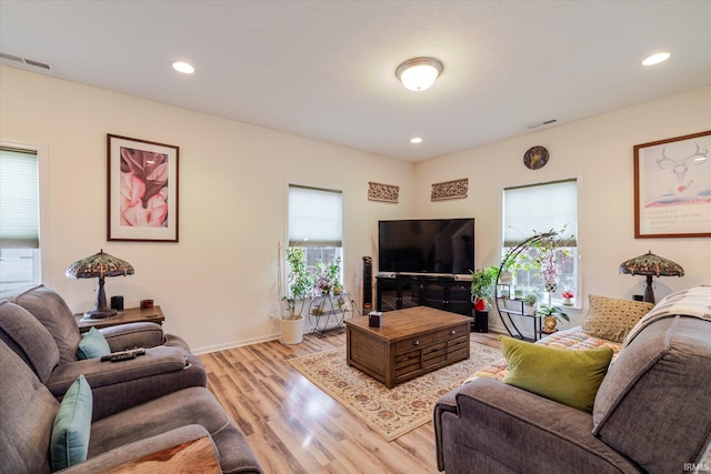 4671 W Hidden Meadow Dr, Bloomington, IN 47404 - living room with light wood-type flooring, recessed lighting, and baseboards