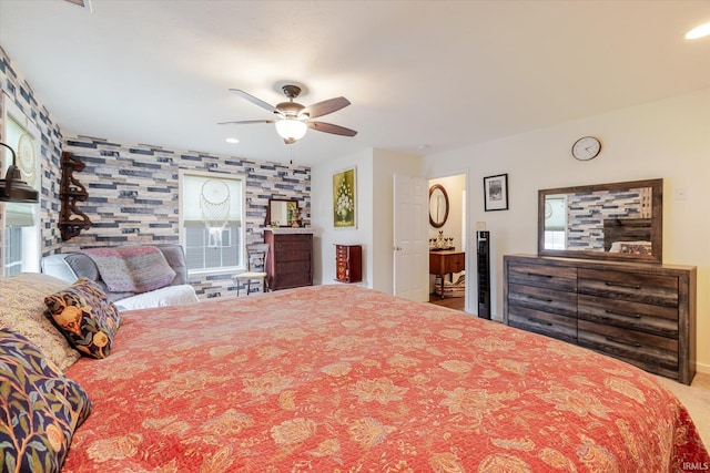 4671 W Hidden Meadow Dr, Bloomington, IN 47404 - carpeted bedroom with baseboards, an accent wall, ceiling fan, and recessed lighting