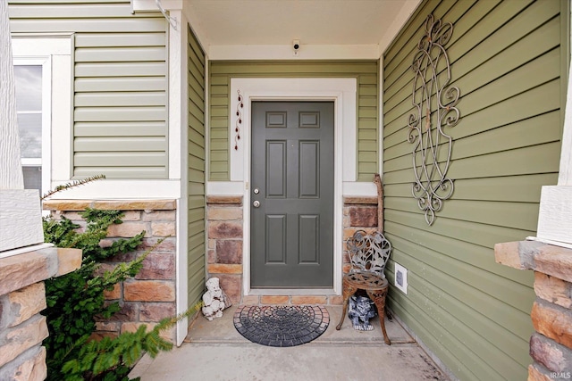4671 W Hidden Meadow Dr, Bloomington, IN 47404 - doorway to property with a porch
