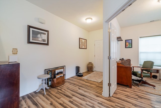 4671 W Hidden Meadow Dr, Bloomington, IN 47404 - office area with wood finished floors and baseboards
