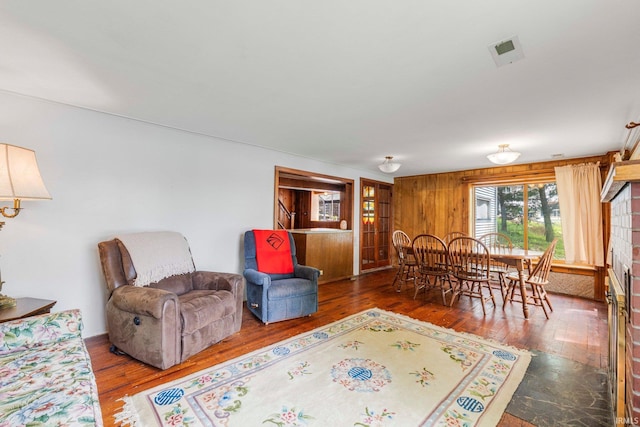 9465 E 1000 N, Syracuse, IN 46567 - dining room with wood-type flooring and wood walls
