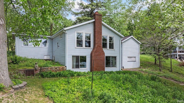 9465 E 1000 N, Syracuse, IN 46567 - back of property with a chimney