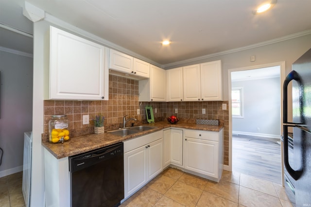 2067 Waggoner Ave, Evansville, IN 47714 - kitchen with black appliances, a sink, backsplash, white cabinets, and crown molding