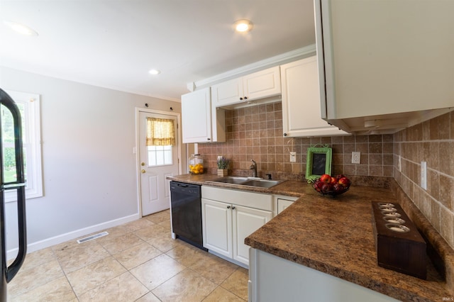 2067 Waggoner Ave, Evansville, IN 47714 - kitchen with dishwasher, a sink, tasteful backsplash, dark countertops, and white cabinetry