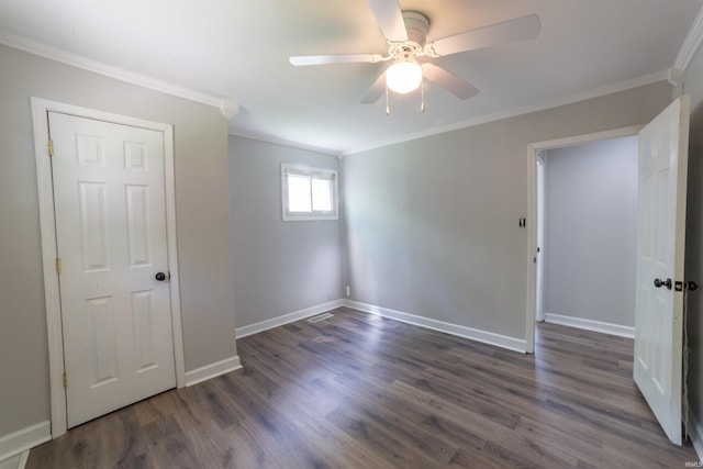 2067 Waggoner Ave, Evansville, IN 47714 - spare room with ornamental molding, ceiling fan, wood finished floors, and baseboards