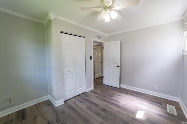 2067 Waggoner Ave, Evansville, IN 47714 - unfurnished bedroom with wood finished floors, baseboards, a closet, ornamental molding, and ceiling fan