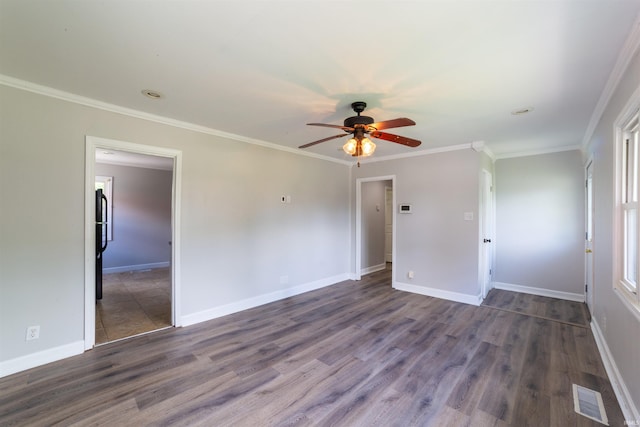 2067 Waggoner Ave, Evansville, IN 47714 - spare room featuring a ceiling fan, baseboards, dark wood-style flooring, and ornamental molding