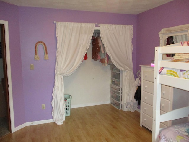 22715 Fair Oaks Ct, Elkhart, IN 46514 - bedroom with wood finished floors and baseboards