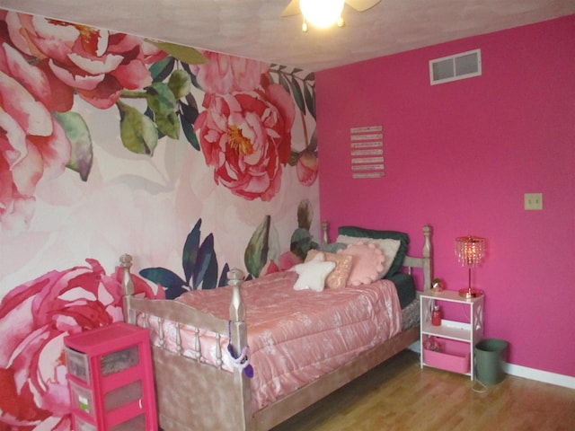 22715 Fair Oaks Ct, Elkhart, IN 46514 - bedroom featuring wood finished floors, baseboards, and ceiling fan