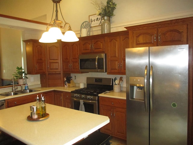 22715 Fair Oaks Ct, Elkhart, IN 46514 - kitchen with appliances with stainless steel finishes, a sink, light countertops, and brown cabinets