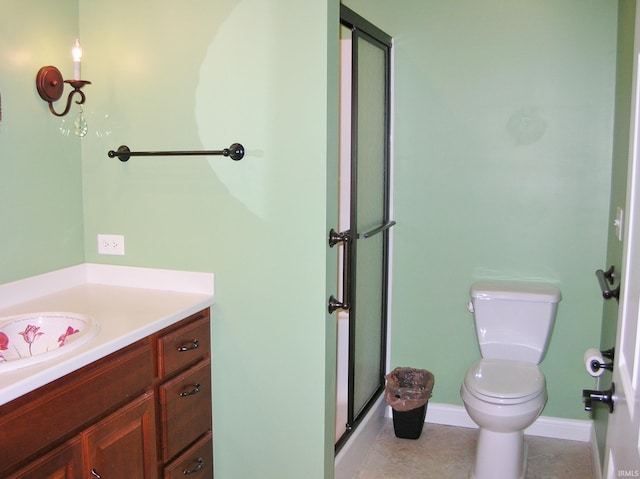 8036 Wolf Creek Ct, Evansville, IN 47712 - bathroom with toilet, vanity, tile patterned flooring, and baseboards