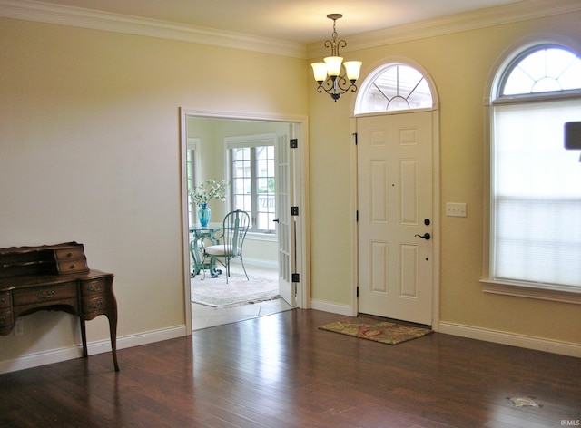 8036 Wolf Creek Ct, Evansville, IN 47712 - entrance foyer with plenty of natural light, a chandelier, wood finished floors, and crown molding
