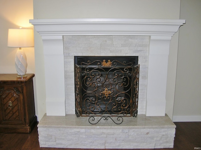 8036 Wolf Creek Ct, Evansville, IN 47712 - detailed view of wood finished floors and a fireplace