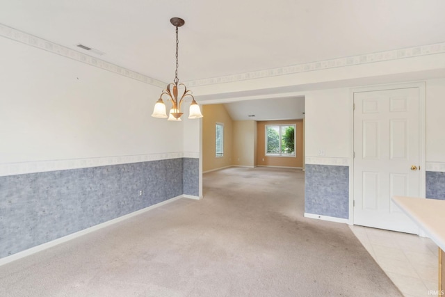 3260 E Sherman St, Columbia City, IN 46725 - unfurnished room with baseboards, light colored carpet, a chandelier, and a wainscoted wall