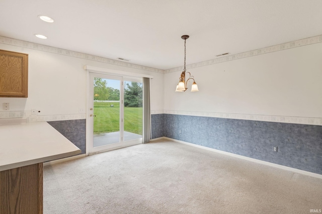 3260 E Sherman St, Columbia City, IN 46725 - unfurnished dining area featuring wainscoting, carpet floors, wallpapered walls, recessed lighting, and baseboards
