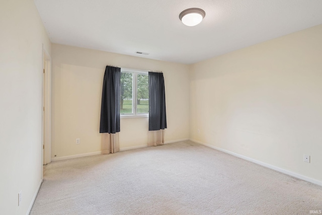 3260 E Sherman St, Columbia City, IN 46725 - empty room featuring carpet floors and baseboards