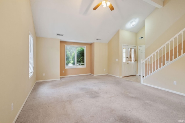 3260 E Sherman St, Columbia City, IN 46725 - unfurnished living room featuring lofted ceiling, ceiling fan, carpet floors, and baseboards