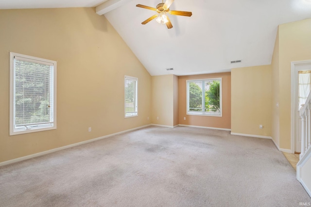 3260 E Sherman St, Columbia City, IN 46725 - spare room with ceiling fan, beam ceiling, light carpet, baseboards, and high vaulted ceiling