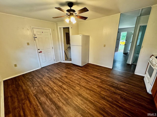 207 S Poplar Dr, Bloomington, IN 47429 - empty room featuring dark wood finished floors, ceiling fan, and baseboards