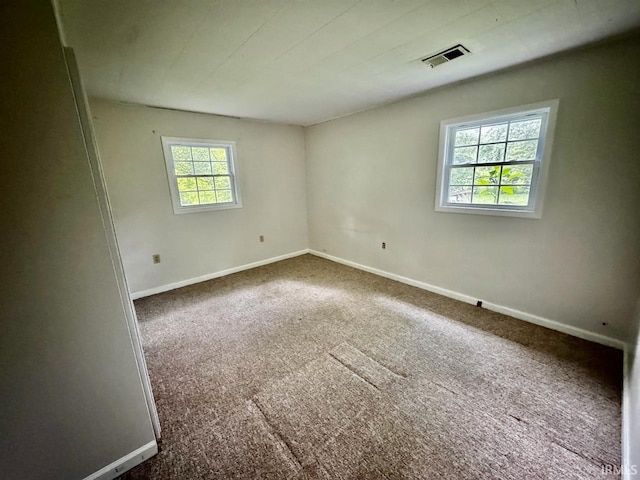 207 S Poplar Dr, Bloomington, IN 47429 - empty room with baseboards and dark carpet