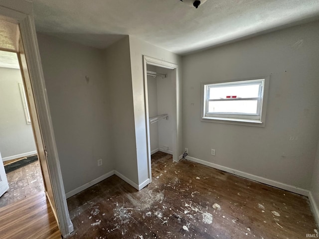2118 Homewood Ave, Mishawaka, IN 46544 - unfurnished bedroom with baseboards and a closet