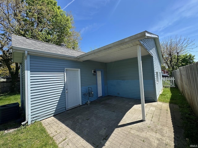 2118 Homewood Ave, Mishawaka, IN 46544 - view of outdoor structure featuring central AC unit and a fenced backyard