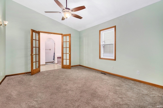 724 E Mishawaka Ave, Mishawaka, IN 46545 - unfurnished room featuring french doors, carpet flooring, a ceiling fan, and lofted ceiling