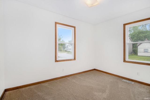 724 E Mishawaka Ave, Mishawaka, IN 46545 - carpeted spare room with baseboards