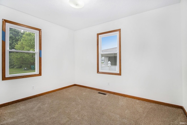 724 E Mishawaka Ave, Mishawaka, IN 46545 - carpeted empty room featuring baseboards