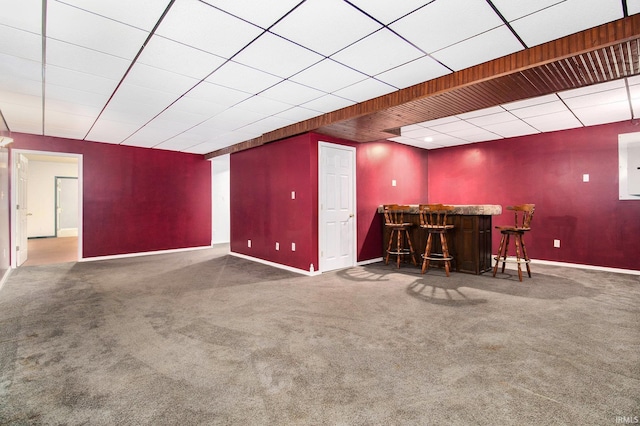 724 E Mishawaka Ave, Mishawaka, IN 46545 - indoor dry bar featuring carpet floors, a drop ceiling, and baseboards