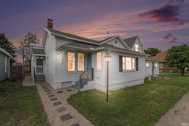 420 W 10th St, Mishawaka, IN 46544 - view of front of property with a chimney and entry steps