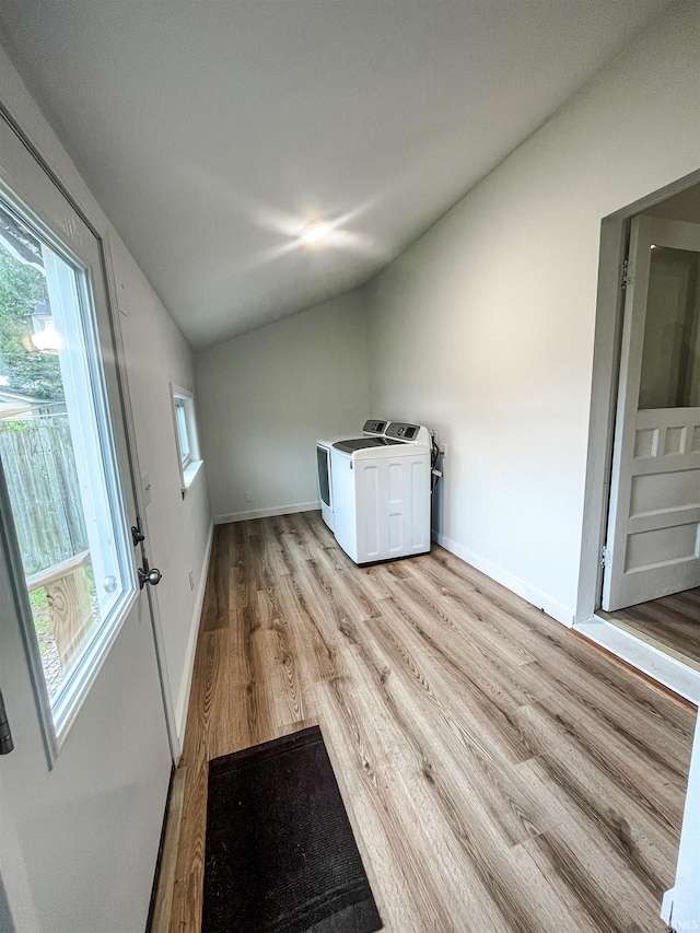 511 E 3rd St, Peru, IN 46970 - washroom with washer and clothes dryer, light wood finished floors, and baseboards