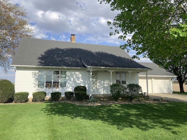 6921 Franke Rd, Fort Wayne, IN 46816 - view of front of property with a chimney, a garage, a front lawn, and driveway