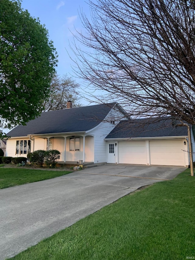 6921 Franke Rd, Fort Wayne, IN 46816 - ranch-style house with a chimney, driveway, and a front yard