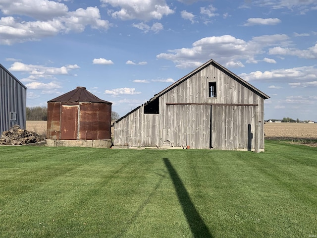 6921 Franke Rd, Fort Wayne, IN 46816 - view of barn featuring a yard
