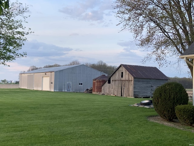 6921 Franke Rd, Fort Wayne, IN 46816 - view of green lawn with an outbuilding