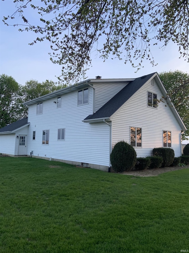 6921 Franke Rd, Fort Wayne, IN 46816 - view of home's exterior with a lawn