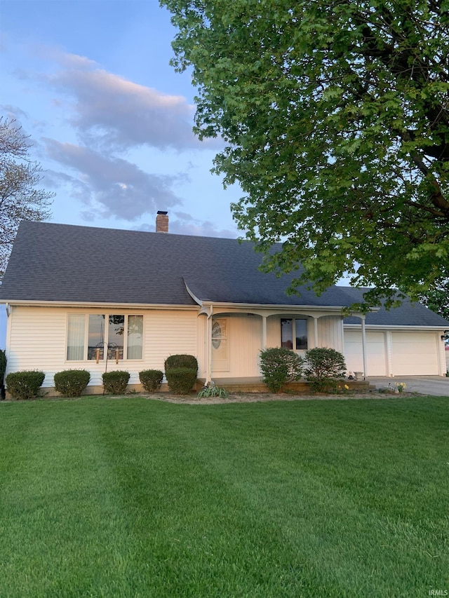 6921 Franke Rd, Fort Wayne, IN 46816 - view of front facade featuring a chimney, driveway, and a front yard