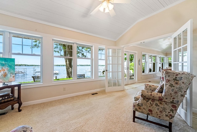 6592 E Waco Dr, Syracuse, IN 46567 - sunroom with vaulted ceiling, baseboards, french doors, a water view, and carpet floors