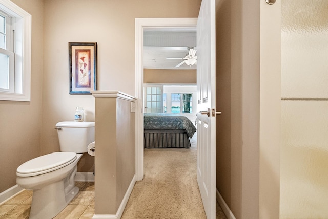 6592 E Waco Dr, Syracuse, IN 46567 - bathroom featuring toilet, baseboards, a ceiling fan, connected bathroom, and tile patterned floors