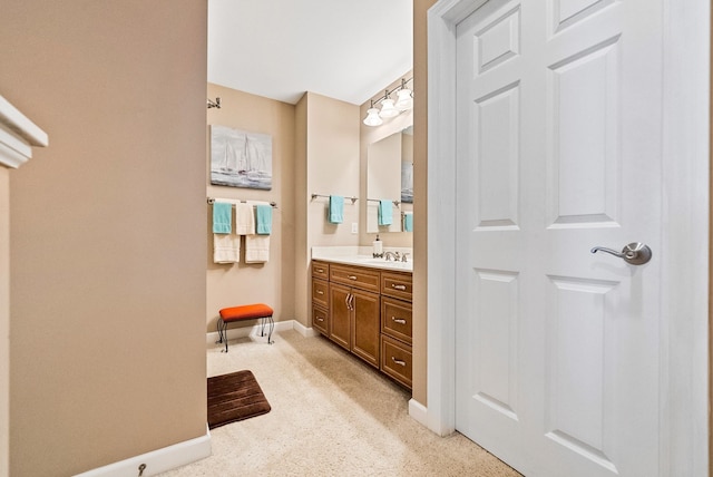 6592 E Waco Dr, Syracuse, IN 46567 - bathroom featuring baseboards and vanity
