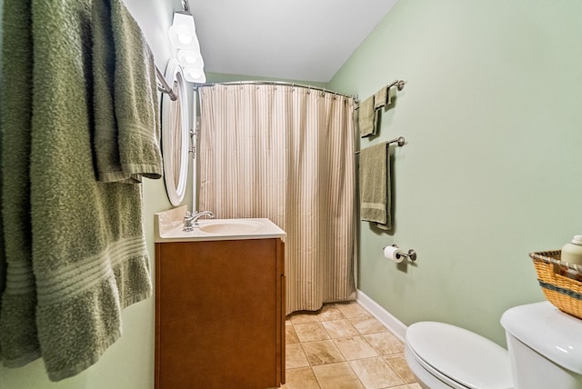 6592 E Waco Dr, Syracuse, IN 46567 - full bathroom featuring toilet, vanity, tile patterned flooring, baseboards, and a shower with curtain