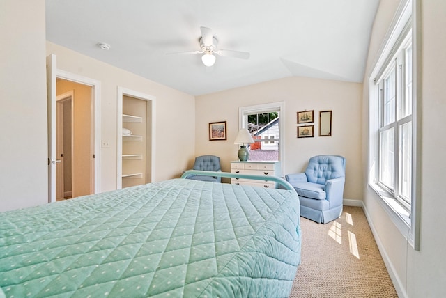 6592 E Waco Dr, Syracuse, IN 46567 - bedroom featuring carpet flooring, a ceiling fan, vaulted ceiling, and baseboards