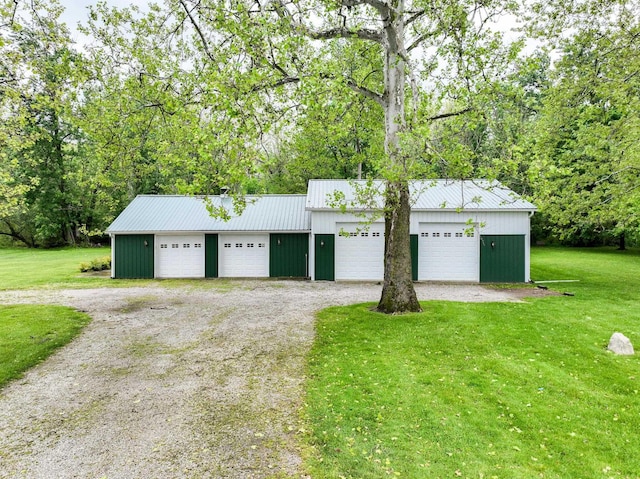 6592 E Waco Dr, Syracuse, IN 46567 - detached garage featuring driveway